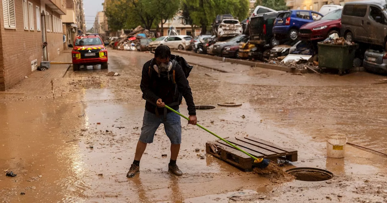 Heavy rains batter Barcelona as search for flood victims goes on in Valencia