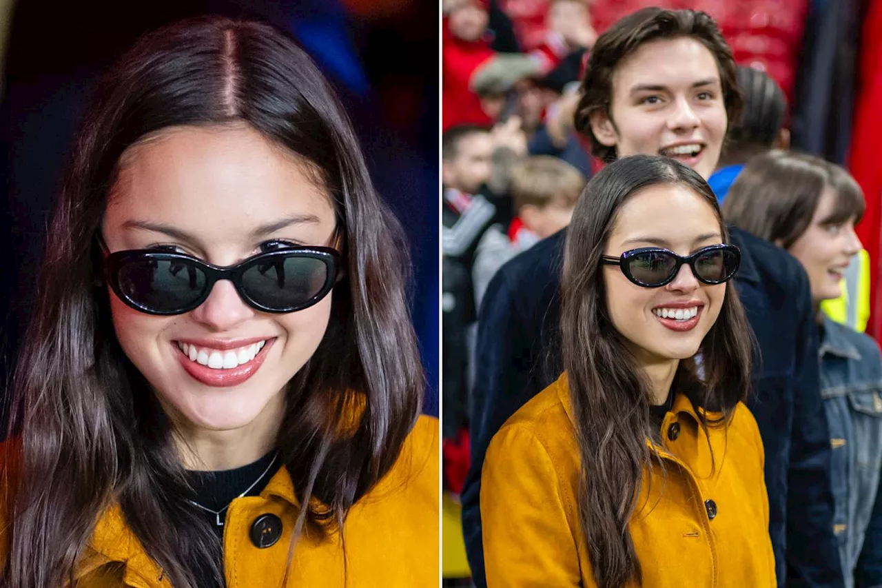 Olivia Rodrigo Wears Dainty ‘L’ Necklace for Boyfriend Louis Partridge on Couple’s Sporty Date in Manchester