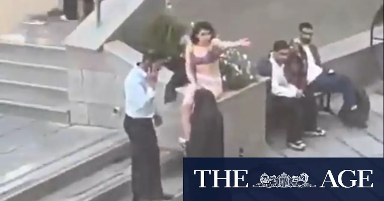 Iranian student harassed for not wearing headscarf strips down on campus