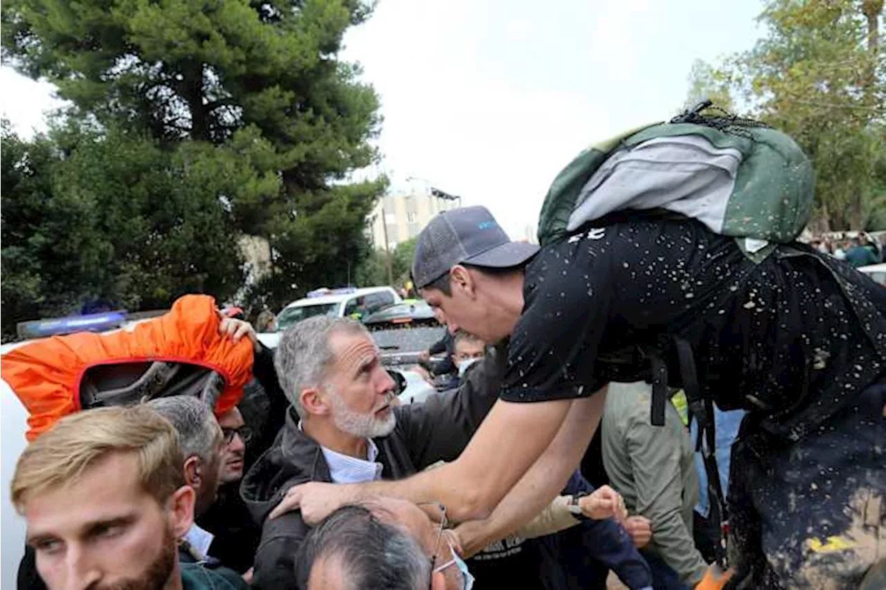 Spain's king stood his ground under a mud barrage. What will the iconic moment mean for his reign?