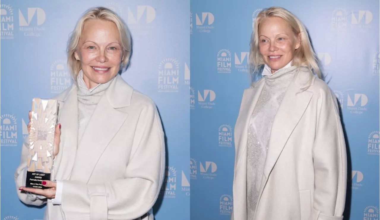 Pamela Anderson Embraces Monochrome Minimalism in Brunello Cucinelli Sweater and Coat at Miami Film Festival