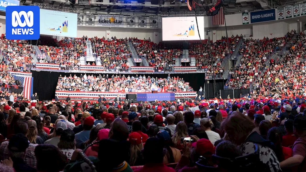 Alt-right media, Secret Service and that orange vest. Explore the faces in the crowd at one of Trump's final rallies