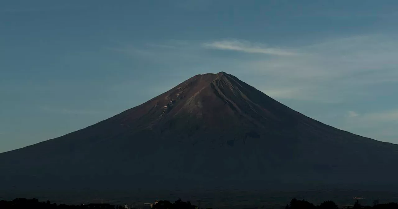 Mount Fuji is without its iconic snowcap in November for the first time in 130 years