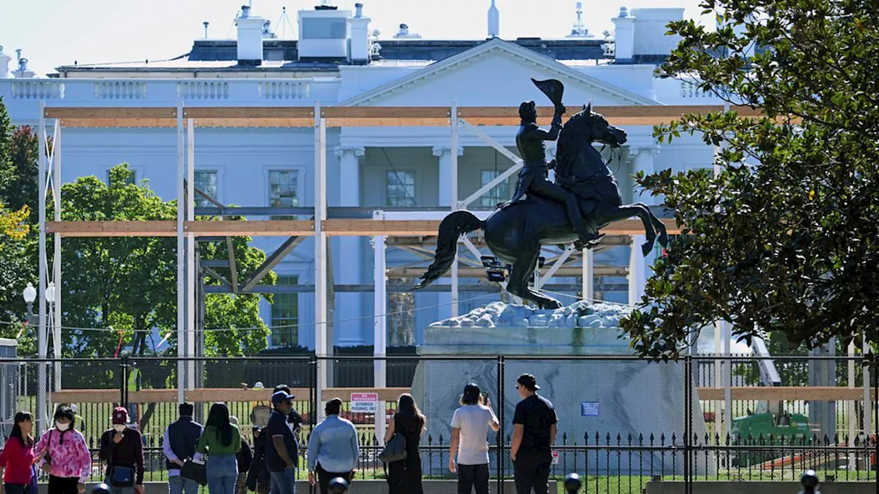 America locked and loaded: White House is barricaded, stores board up and there's a chilling warning...