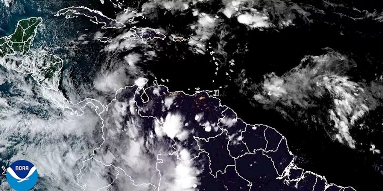 Tropical Storm Rafael Spins Toward The Cayman Islands As Cuba Prepares ...