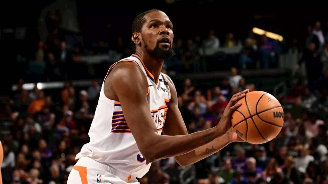 Kevin Durant lifts Suns past Philadelphia 118-116, spoiling Paul George’s 76ers debut