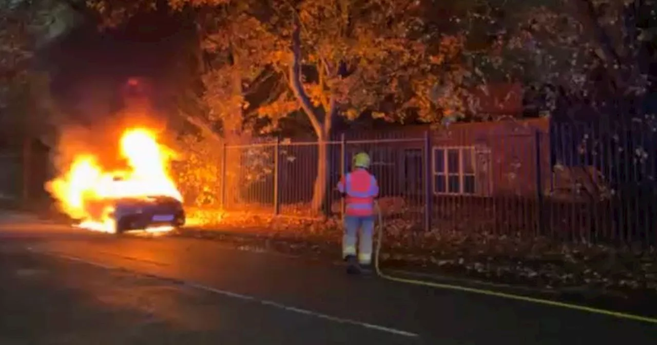 Explosions as car 'full of fireworks' erupts in flames before crews attacked