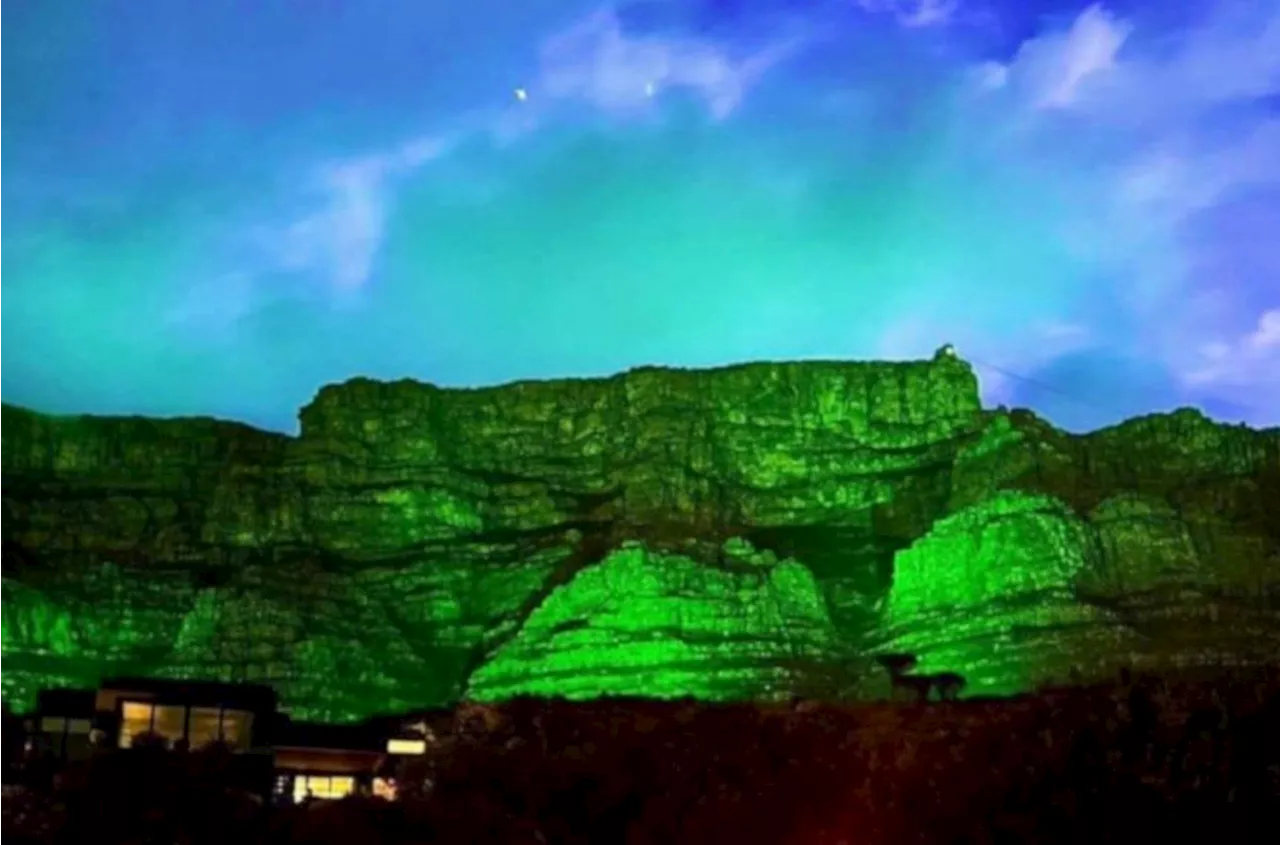 Table Mountain, Cape Town Stadium lit up in green for Earthshot Prize