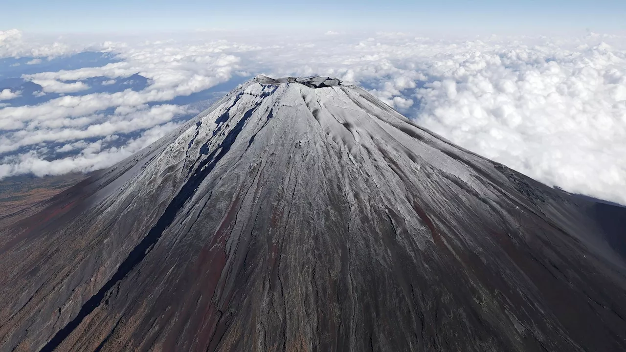 Mount Fuji finally has snow at its peak following record-breaking absence