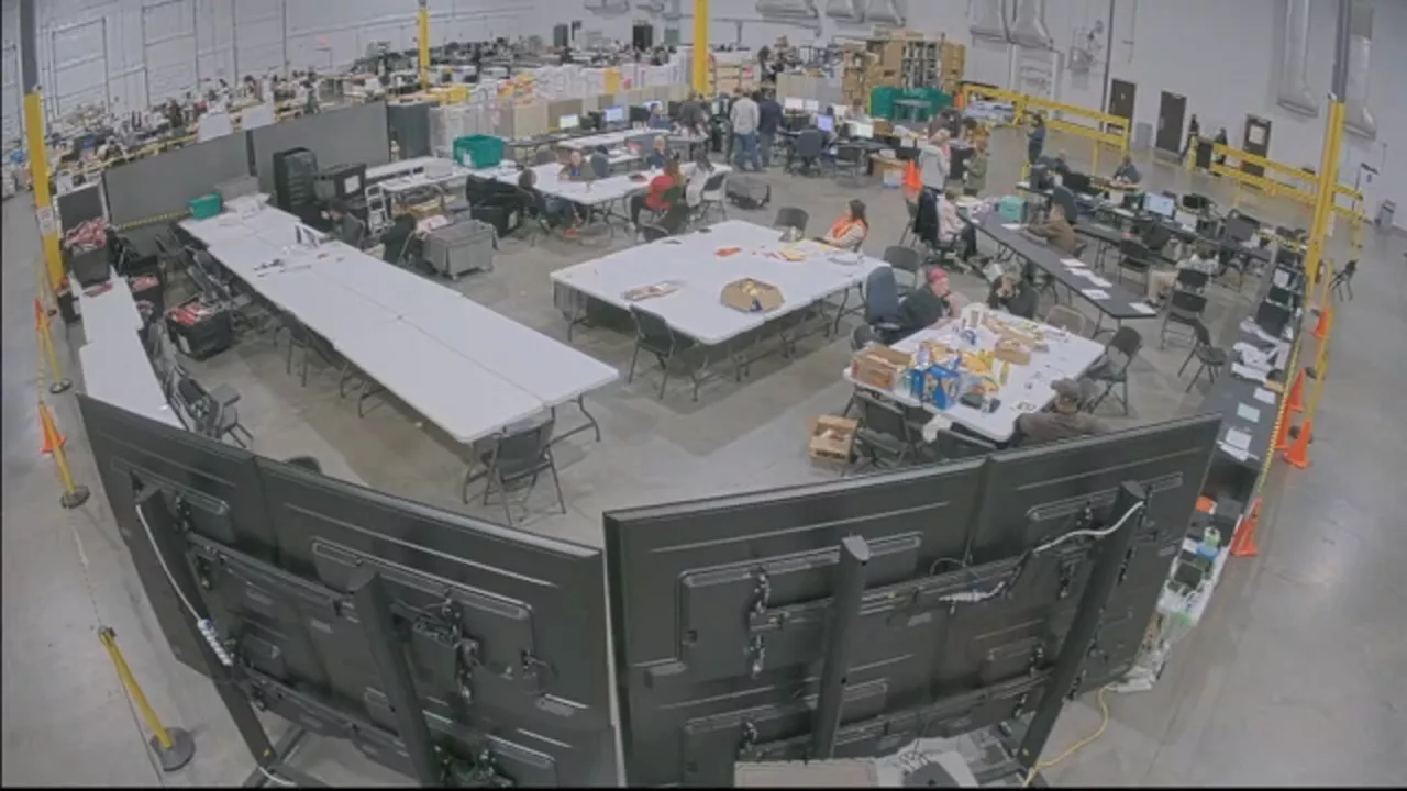 Harris County election workers continue to count ballots at new headquarters in north Houston