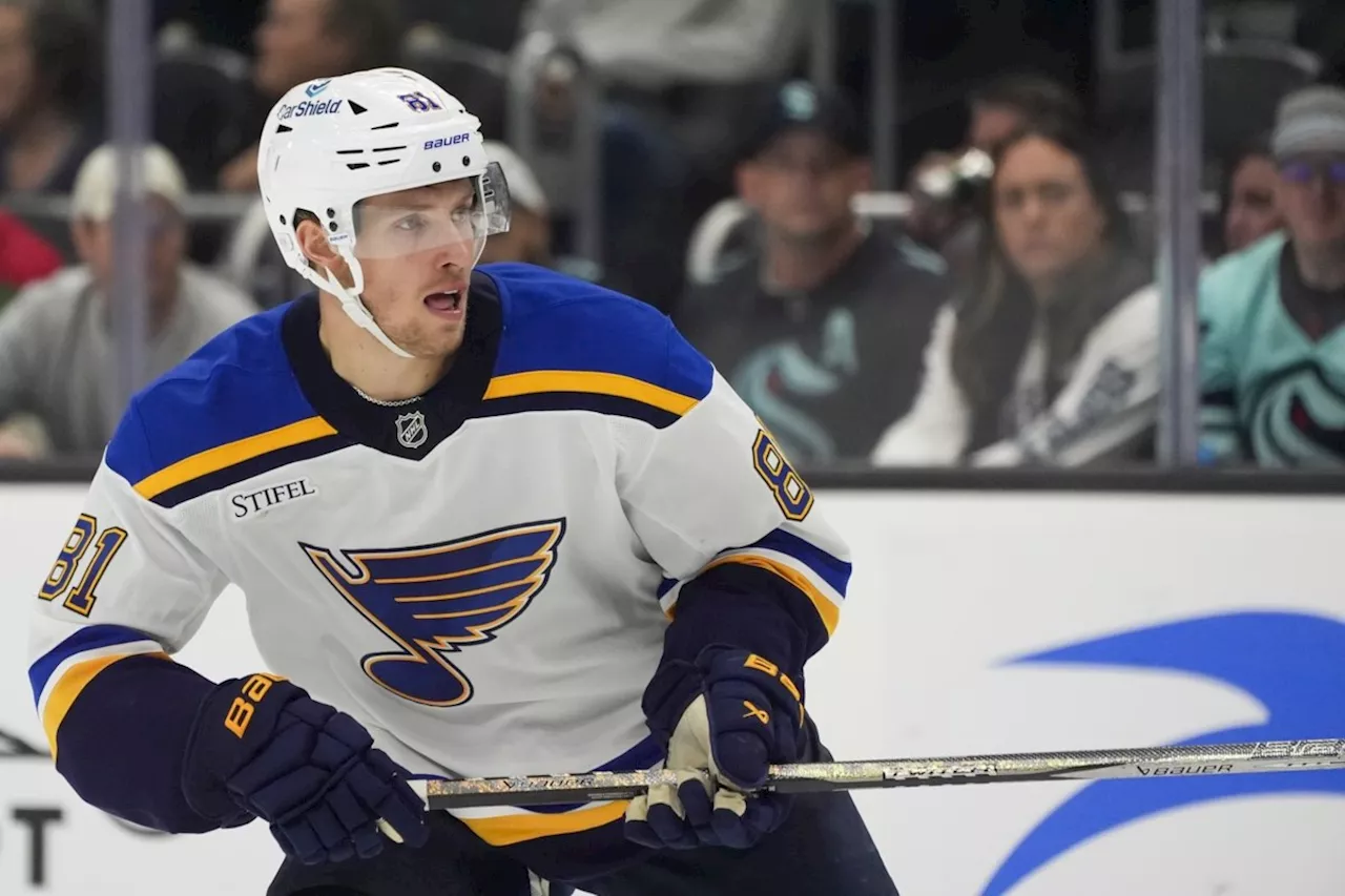 Blues Dylan Holloway rushed to hospital after being struck in neck by puck