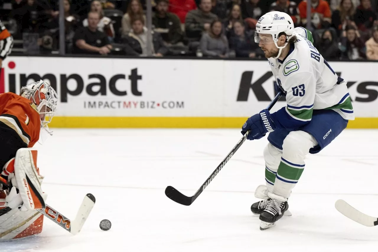 Hughes, Boeser help Canucks rout the Ducks 5-1