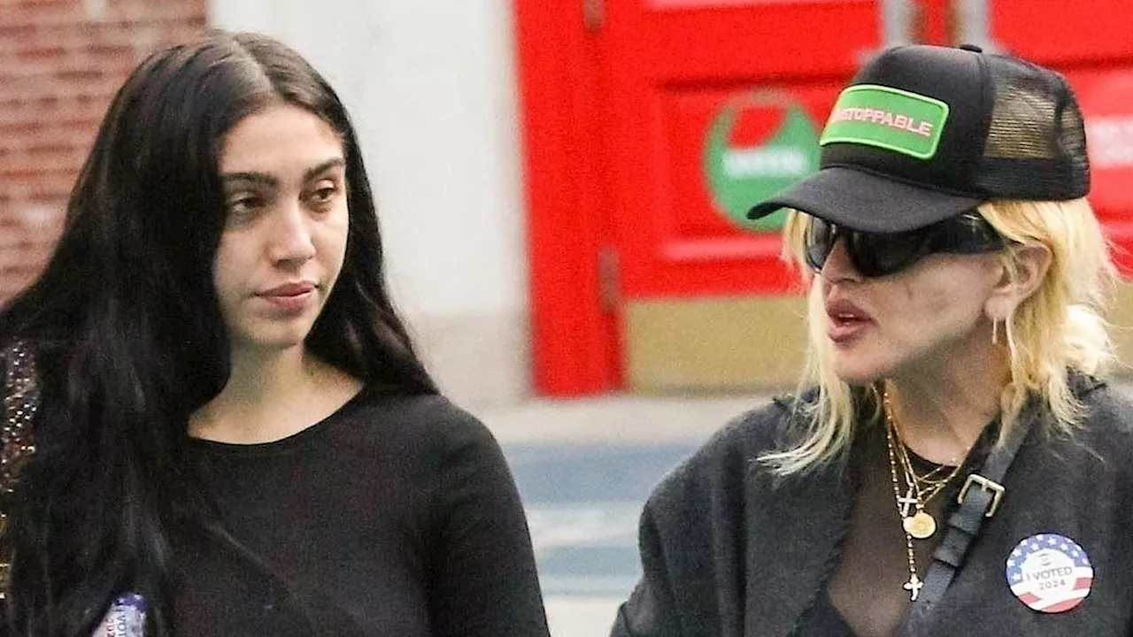 Madonna votes with daughter Lourdes, 28, as she keeps low profile in overcoat and dark glasses