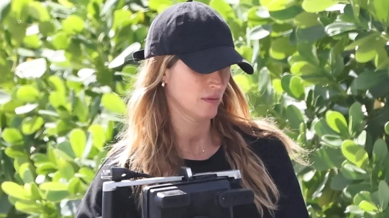 Pregnant Gisele Bundchen surfaces solo amid claims she is happy with 'new life' after Tom Brady...