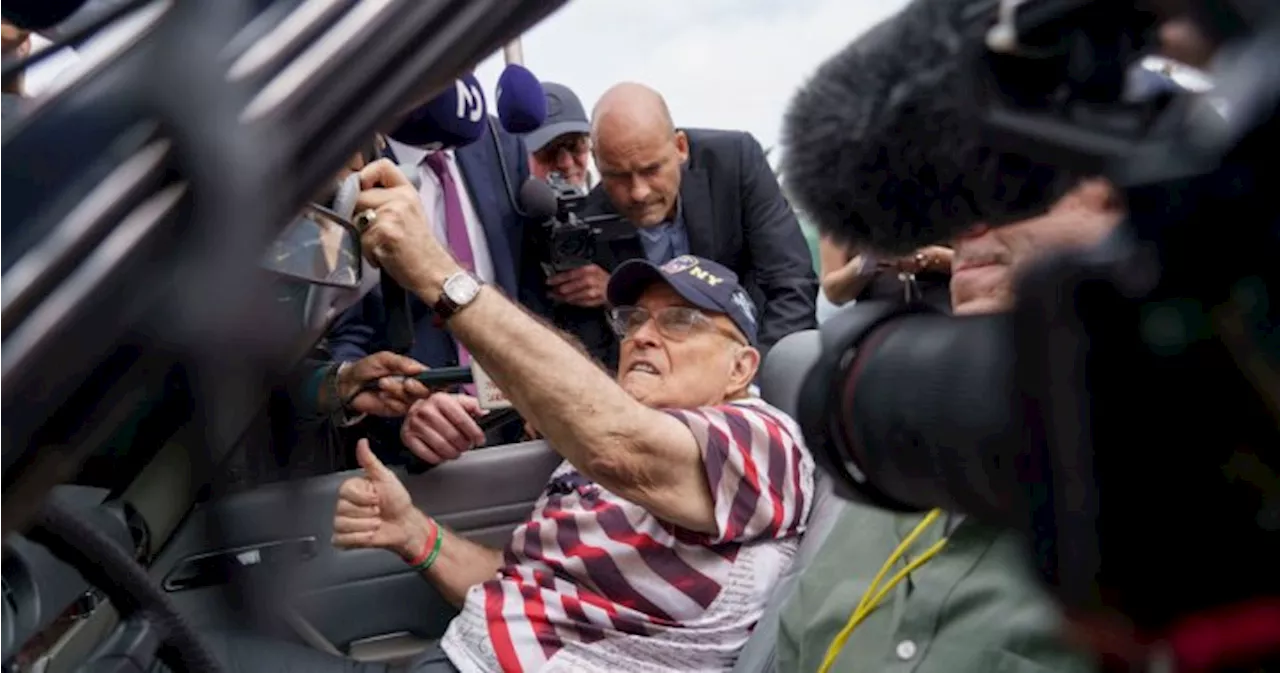 Rudy Giuliani shows up to vote in the Mercedes he was supposed to surrender