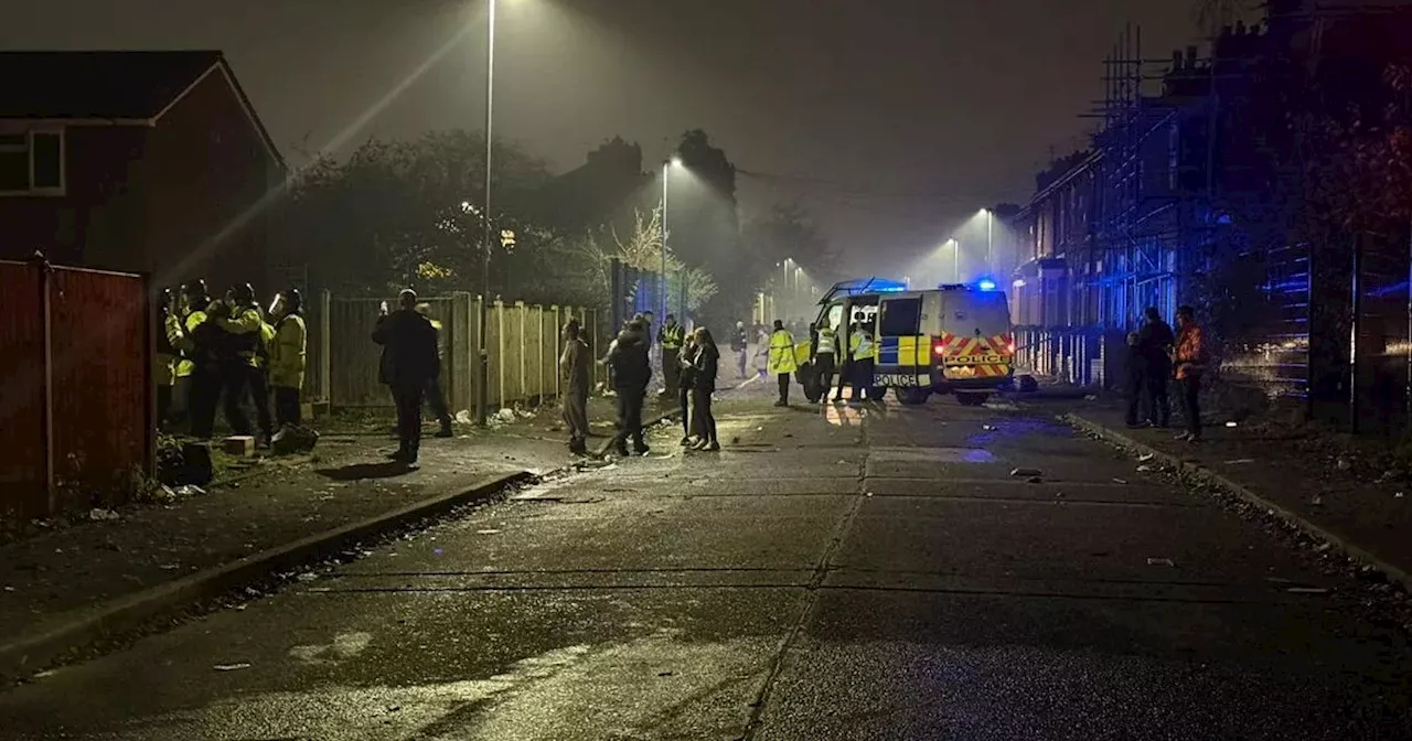 Bonfire night chaos as police pelted with fireworks by huge group of youths in street