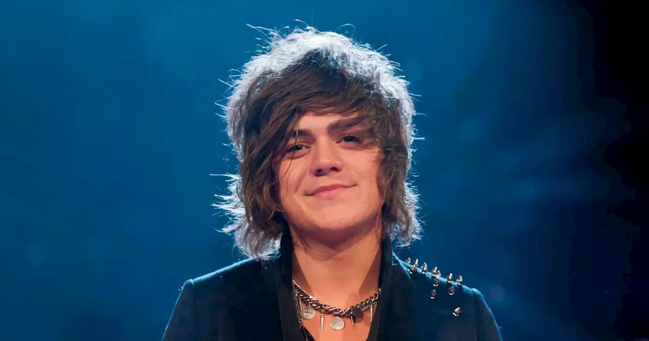 X Factor's Frankie Cocozza unrecognisable with hairy chest, tattoos and son