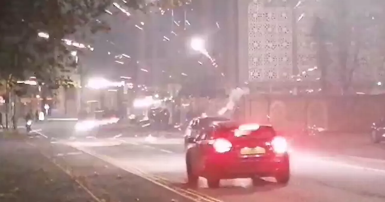 Dramatic footage shows 'fireworks war' break out in city