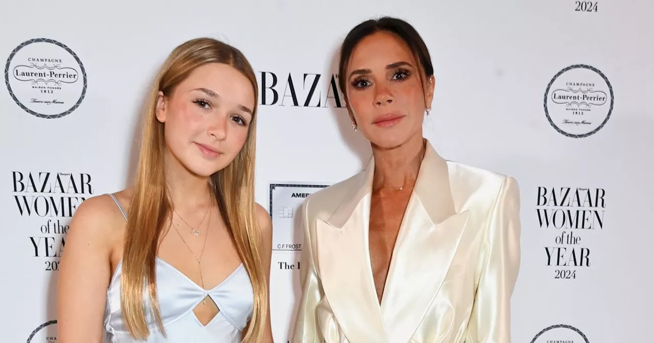 Victoria Beckham presented with women of the year prize by daughter Harper, 13