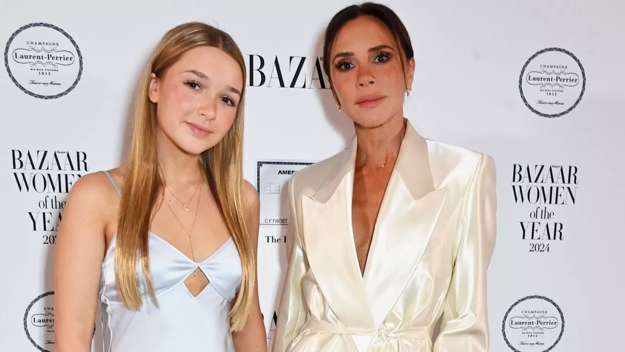 Harper Beckham presents mum Victoria with a Harper's Bazaar women of the year prize