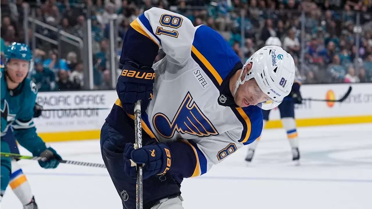 Blues' Holloway in alert, stable condition after taking puck to neck