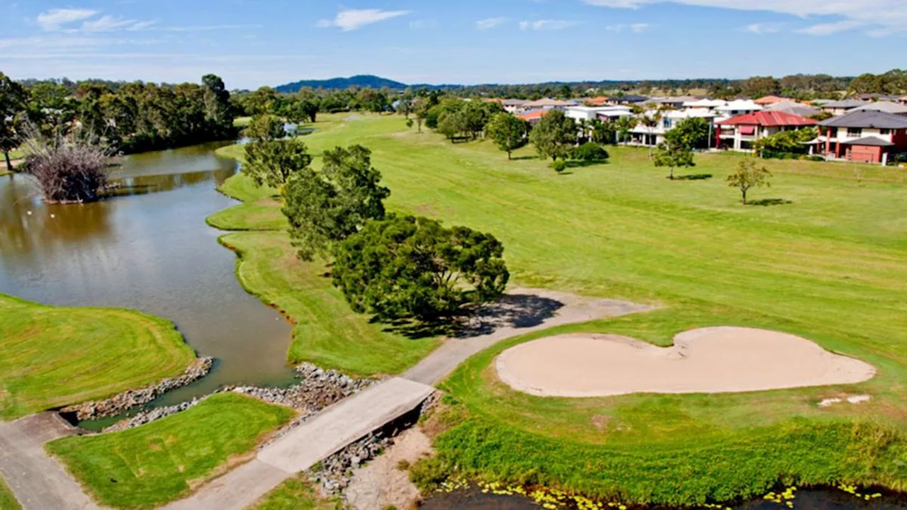 Elderly man fighting for life in mower rollover at Windaroo Lakes Golf Club