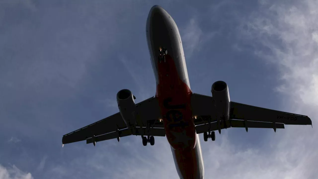 Thai man charged after alleged assault over overhead luggage incident on Sydney-bound flight from Wellington