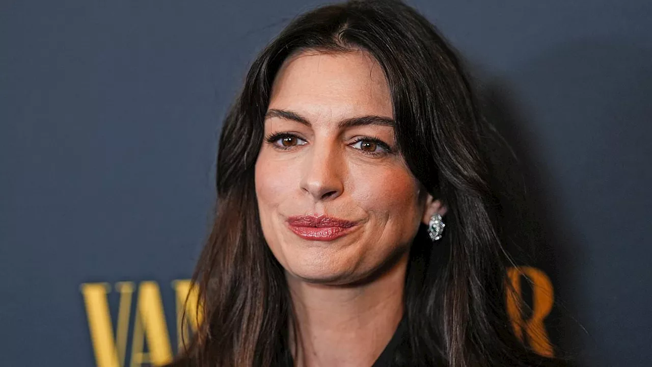 Anne Hathaway's bizarre singing post urging fans to vote leaves the internet baffled