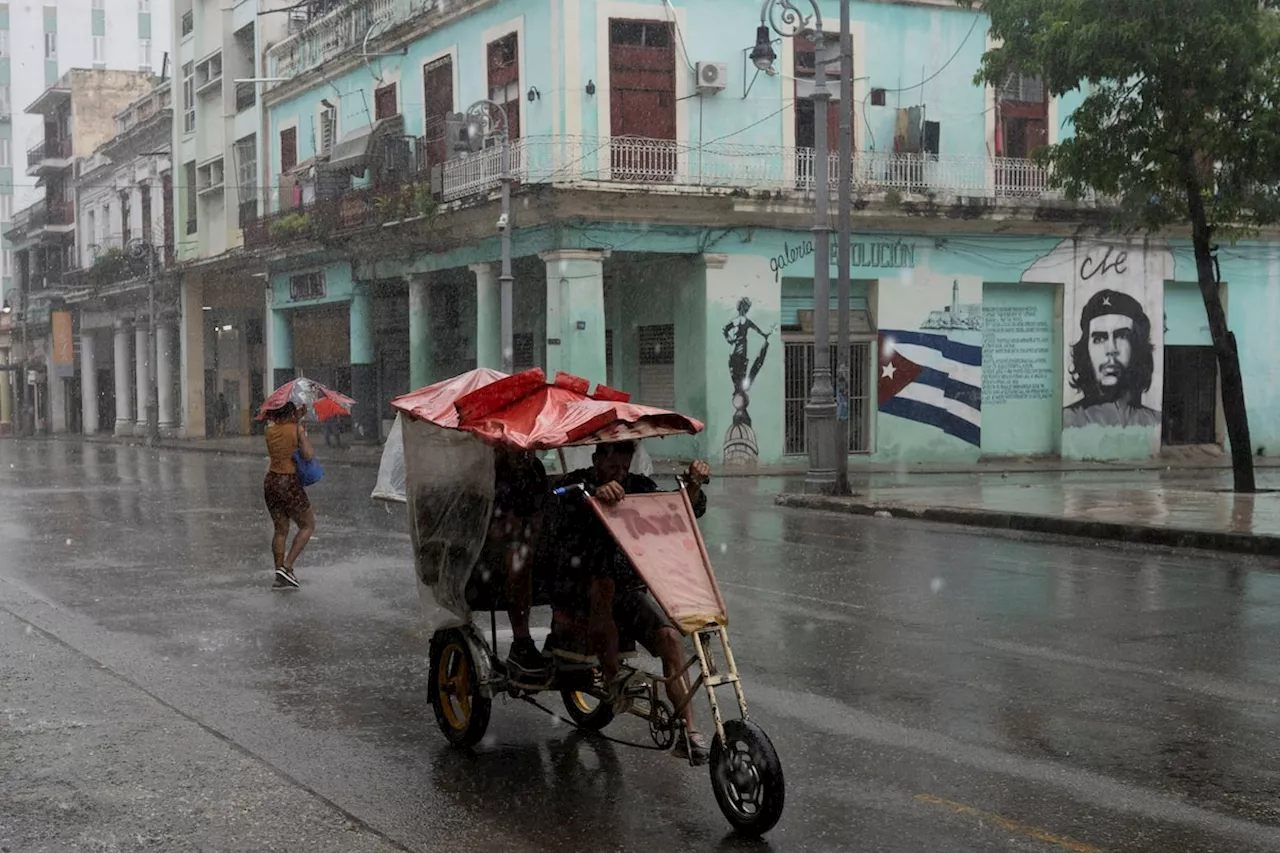 Cuba left reeling after Hurricane Rafael ravages island, knocks out power grid