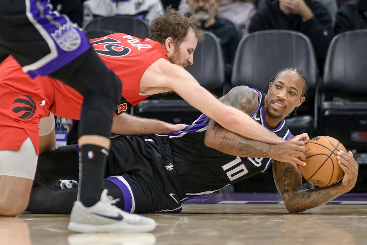 DeMar DeRozan scores 27 points to lead the Kings past the Raptors 122-107