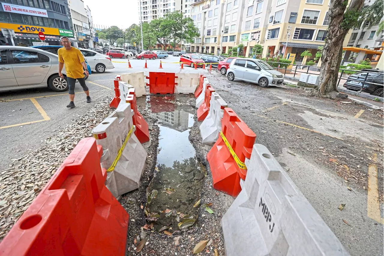 Sizeable pothole upsetting traffic flow in Damansara Perdana