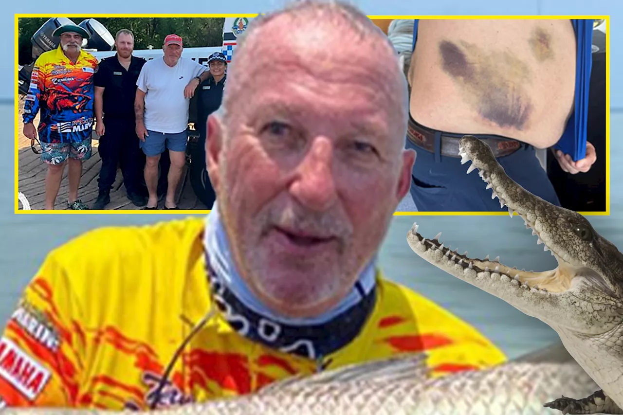 England cricket legend Sir Ian Botham rescued by ex-rival after falling in crocodile-infested waters...