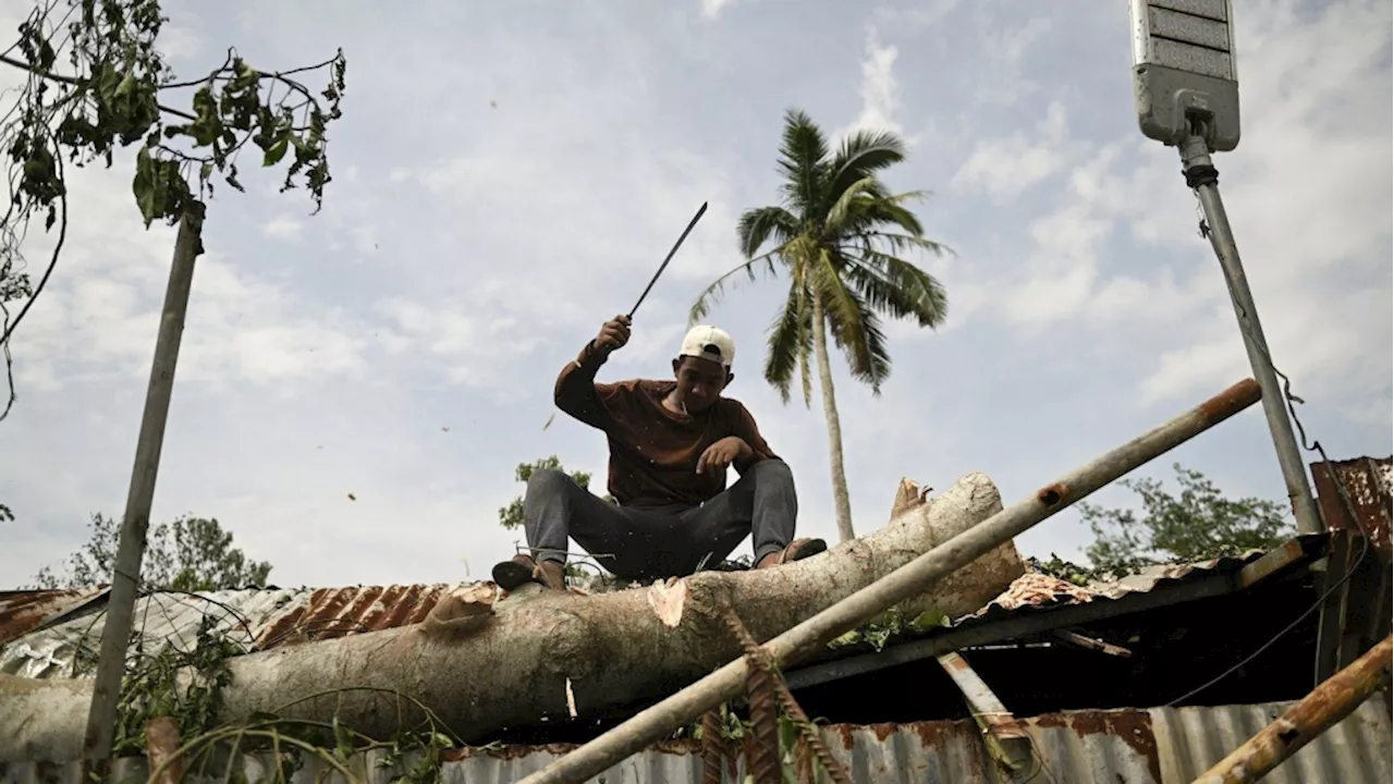 Typhoon floods villages, rips off roofs and damages 2 domestic airports in northern Philippines