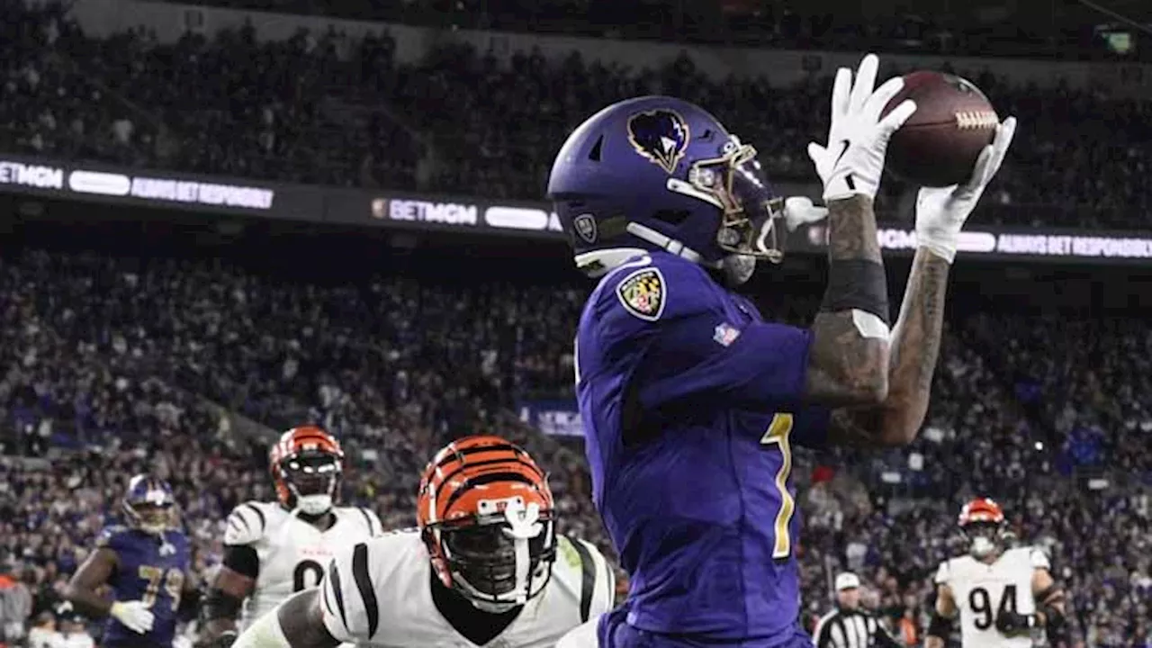 Jackson leads rally, and Ravens stop 2-point attempt to hold off Bengals 35-34