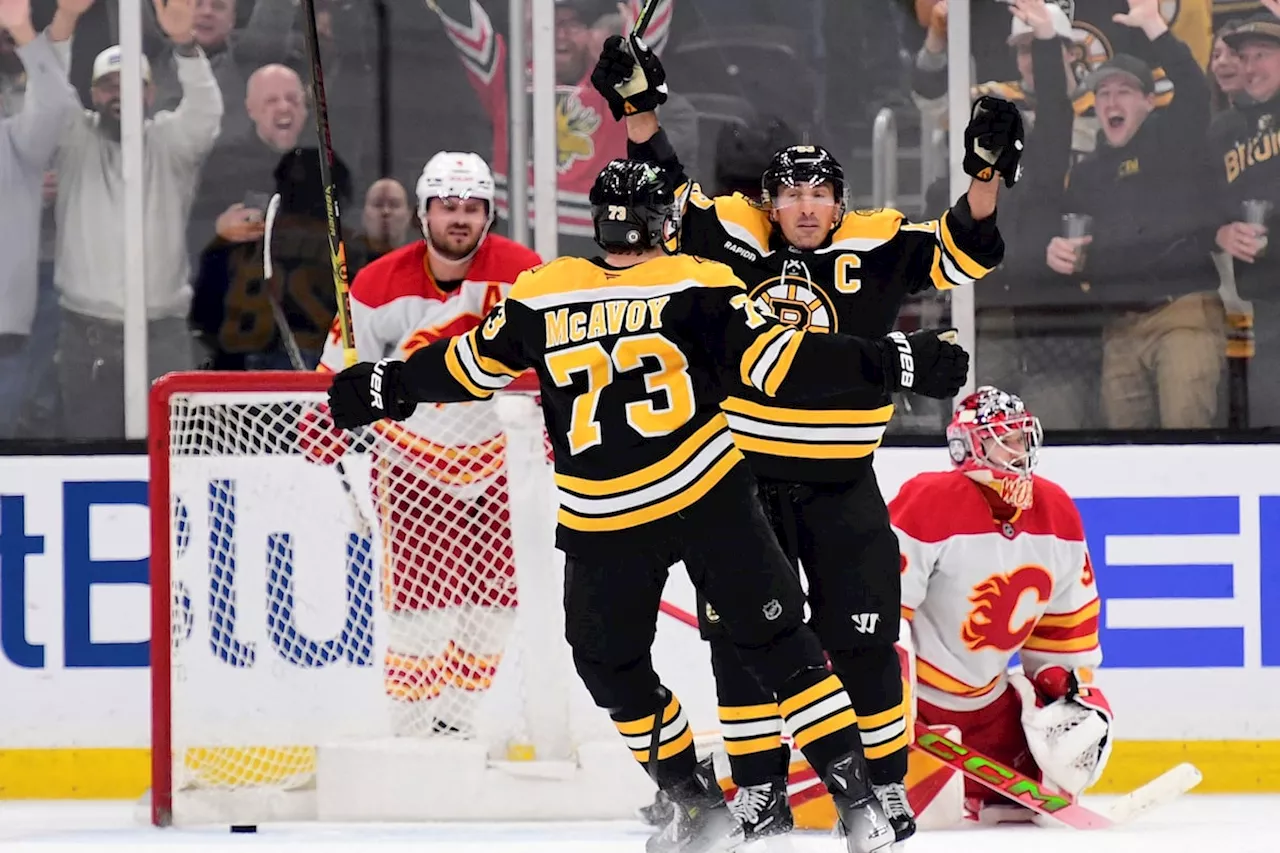 Brad Marchand scores overtime goal to lead Bruins to 4-3 victory over Flames