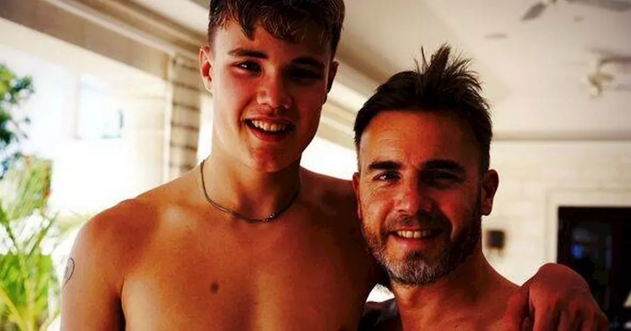 Gary Barlow pokes fun at son's height as they work up a sweat in gym ...