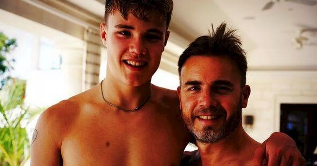 Gary Barlow pokes fun at son's height as they work up a sweat in gym