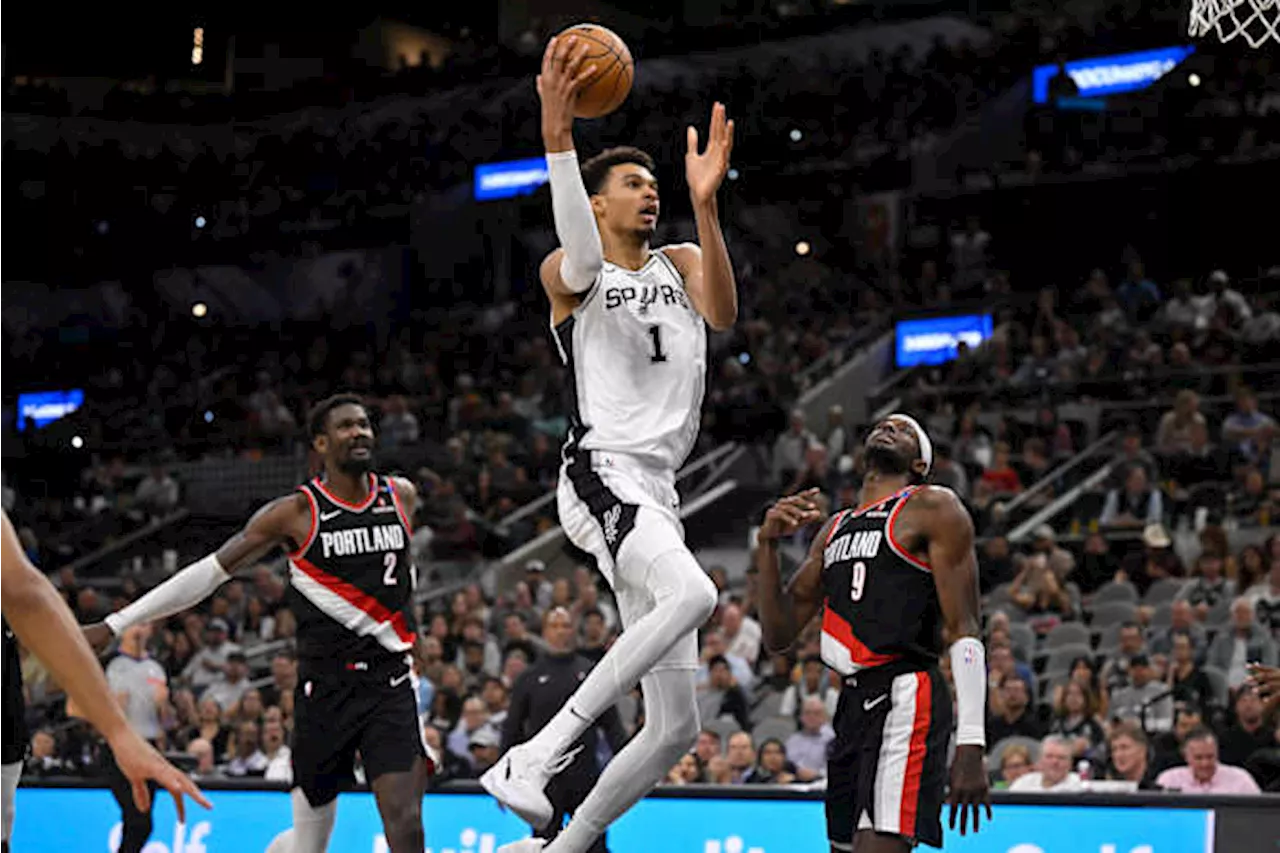 Spurs beat Trail Blazers 118-105, with Popovich missing his 4th straight game