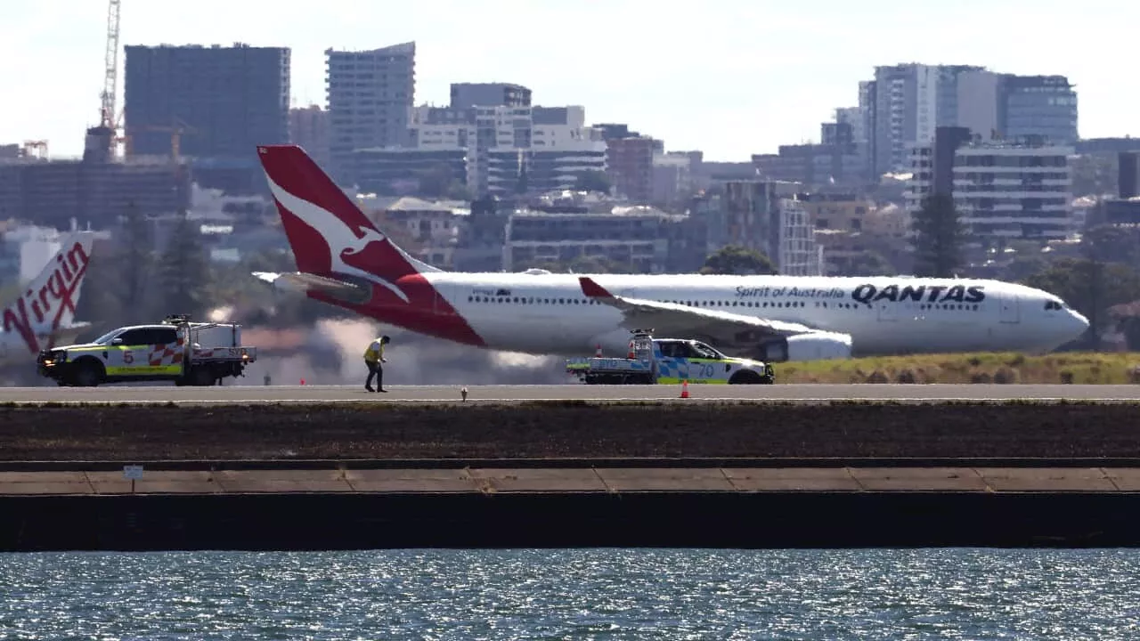 Qantas plane's engine failure sparked grass fire, as passengers recount 'disturbing' flight