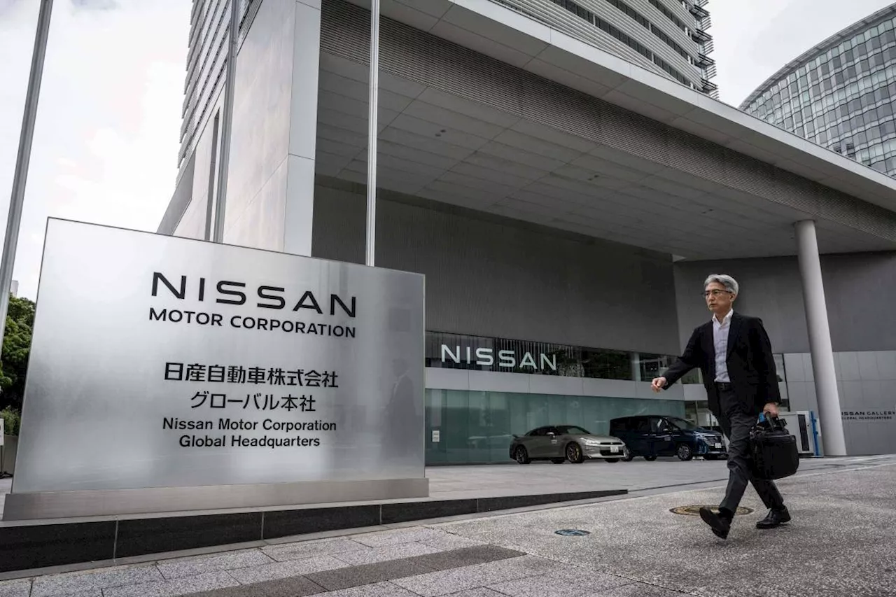 Nissan to lay off workers, lowers forecast