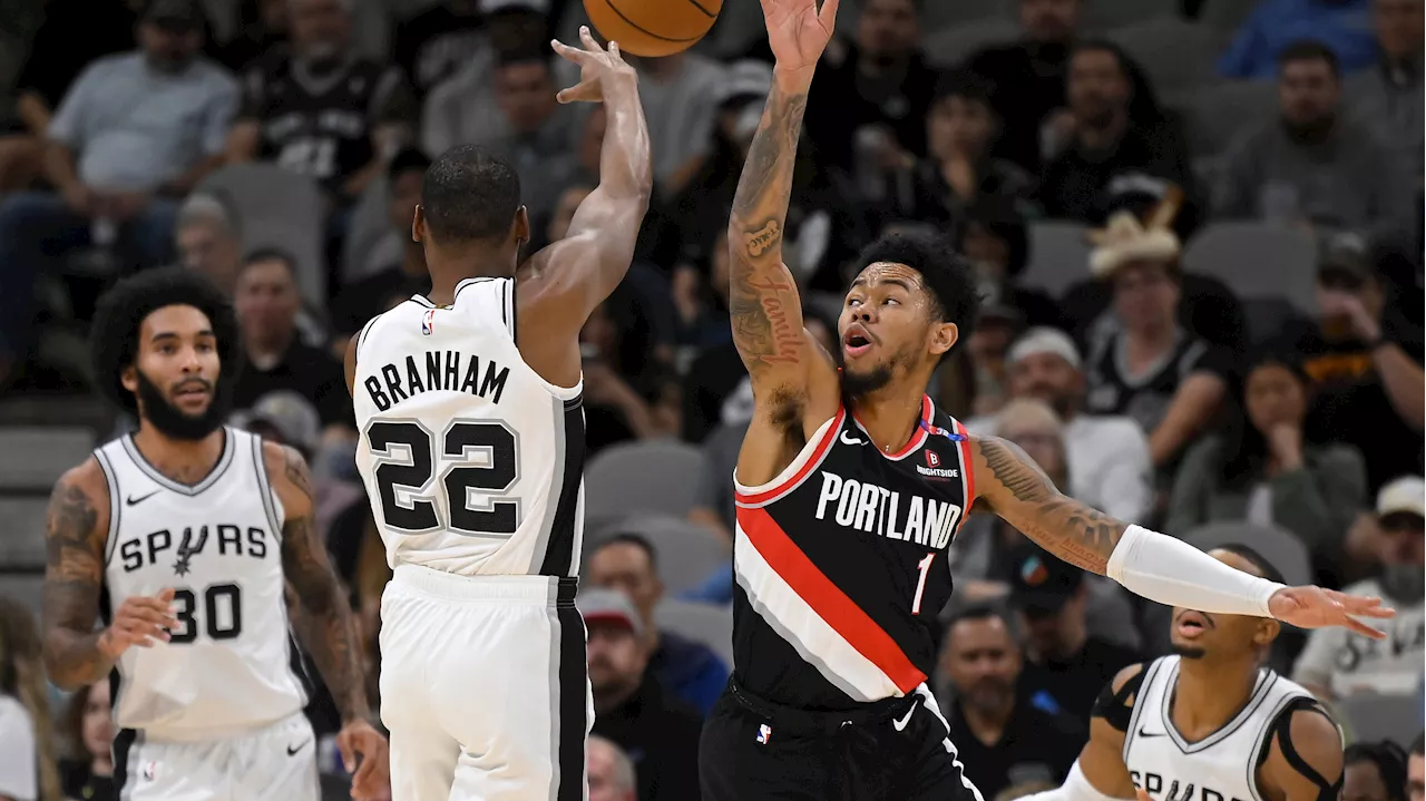 Spurs beat Trail Blazers with Popovich missing his fourth straight game