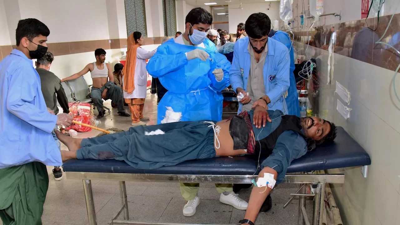 At least 17 killed in Pakistan train station bombing, officials say