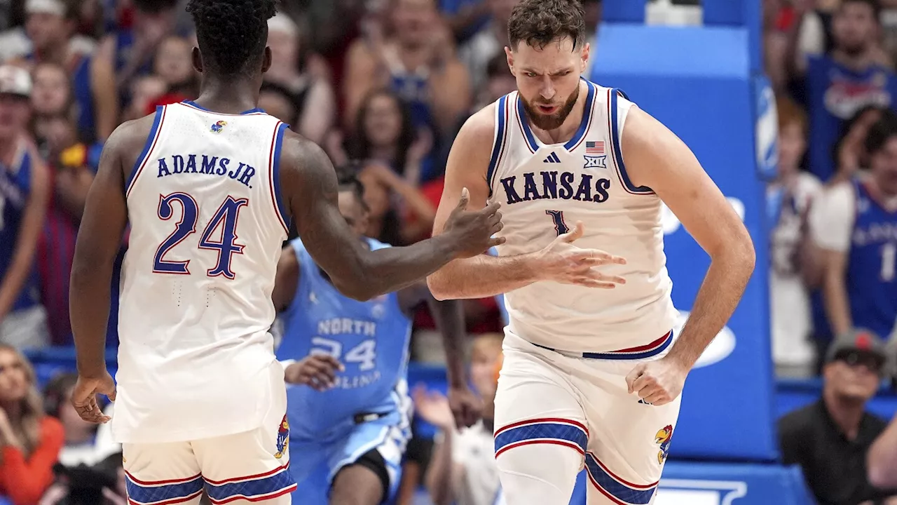 No. 1 Kansas blows big lead, holds off No. 9 North Carolina in tussle of hoops heavyweights