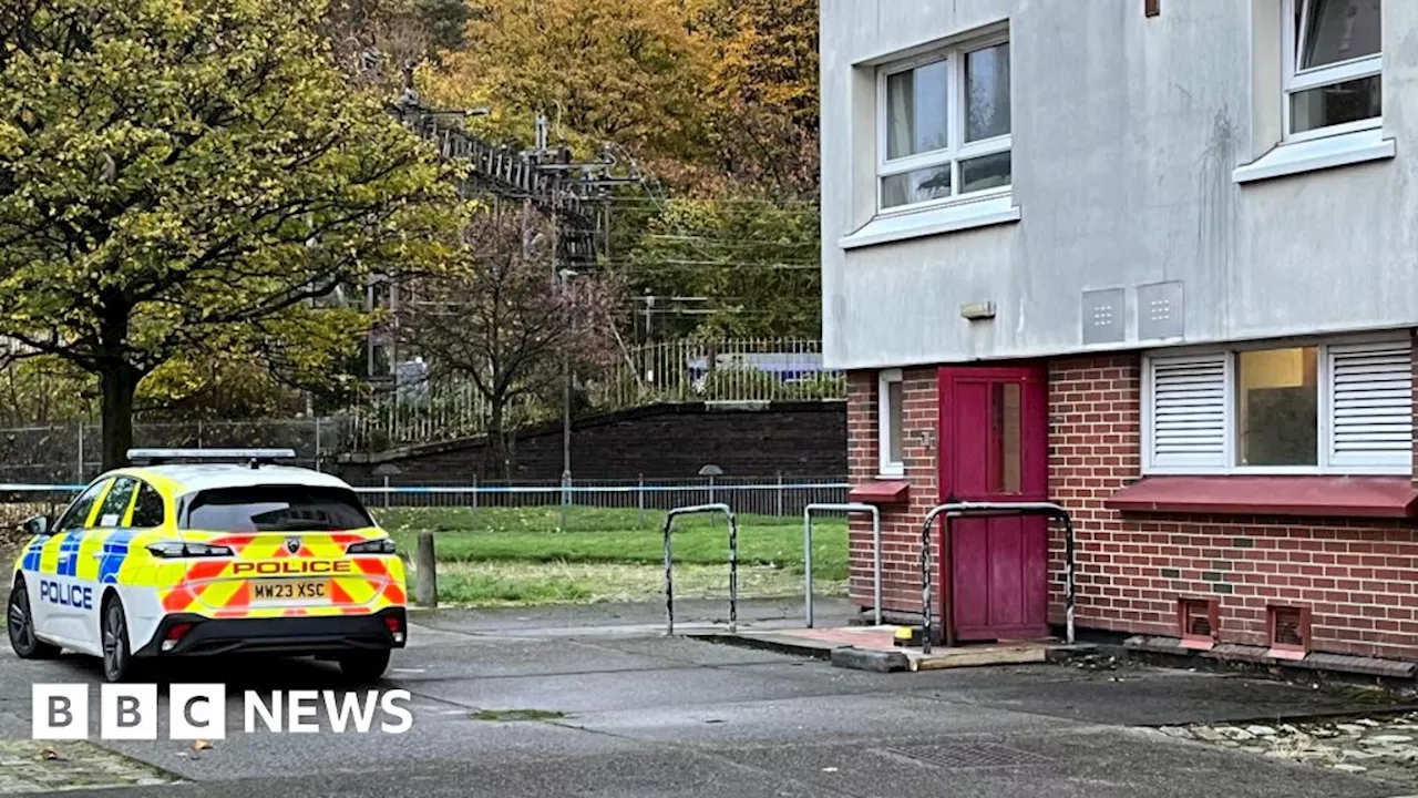 Second man charged over Clydebank tower block 'suspect item' evacuation