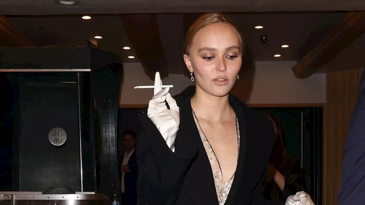 Lily Rose Depp puffs on a cigarette while supporting girlfriend 070 Shake at Petrichor premiere in...