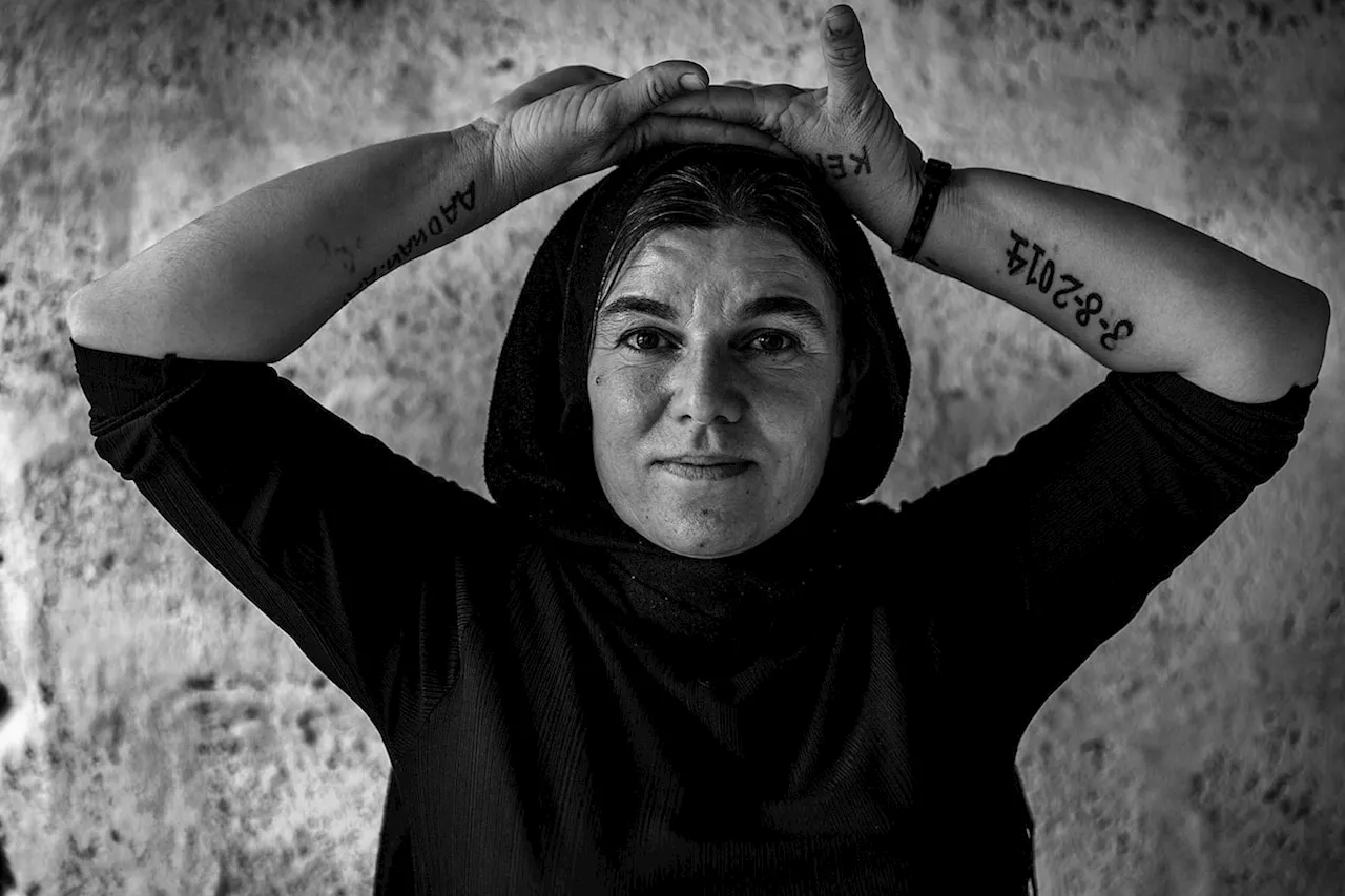 Yazidi women’s tales of tears are etched in their skin with ash and milk