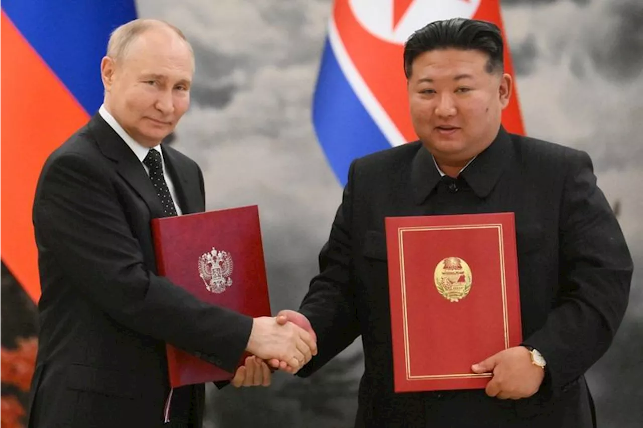 Putin signs into law mutual defense treaty with North Korea