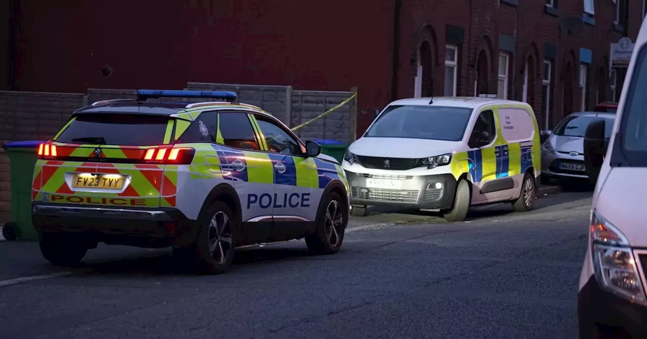 Police cordon in place on street as forensics comb through house