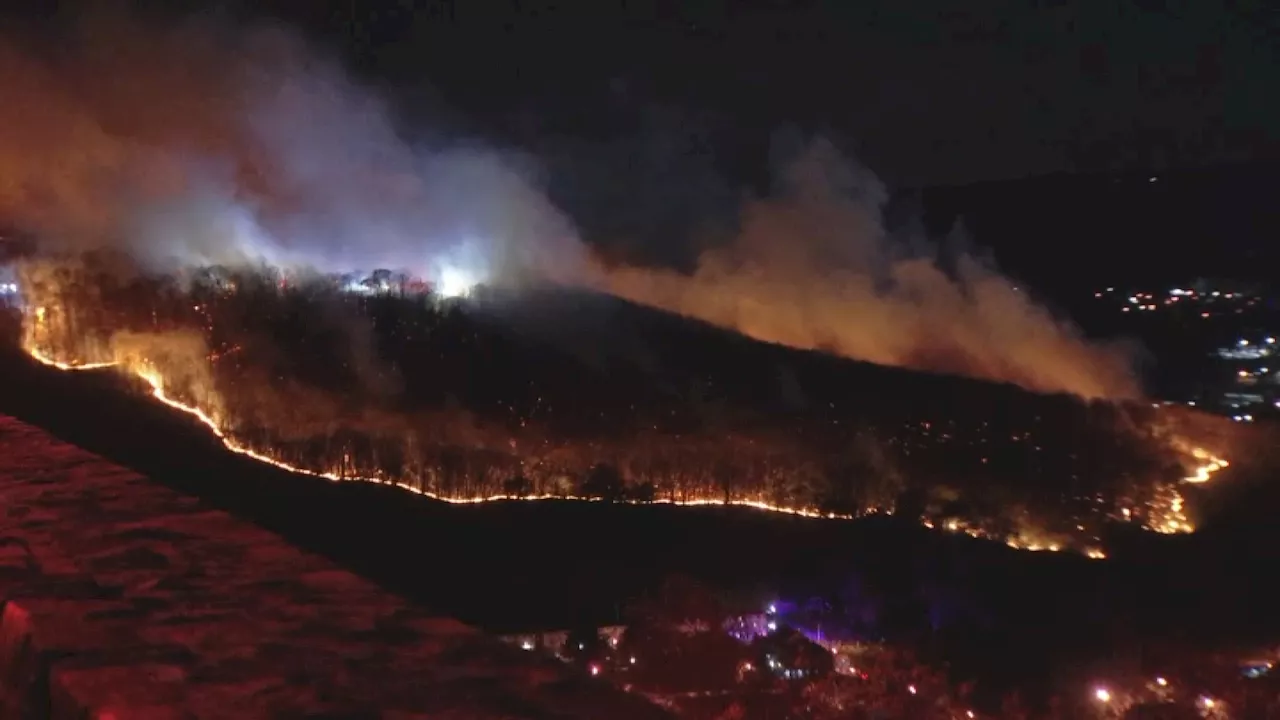 Brush fire spreads through Neversink Mountain in Berks County, Pa.