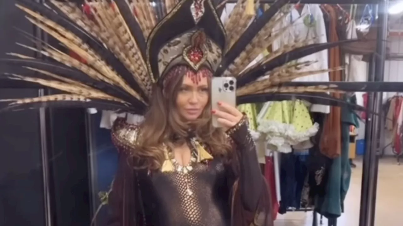 Charlotte Dawson shows off her huge baby bump in stunning skin-tight panto outfit...